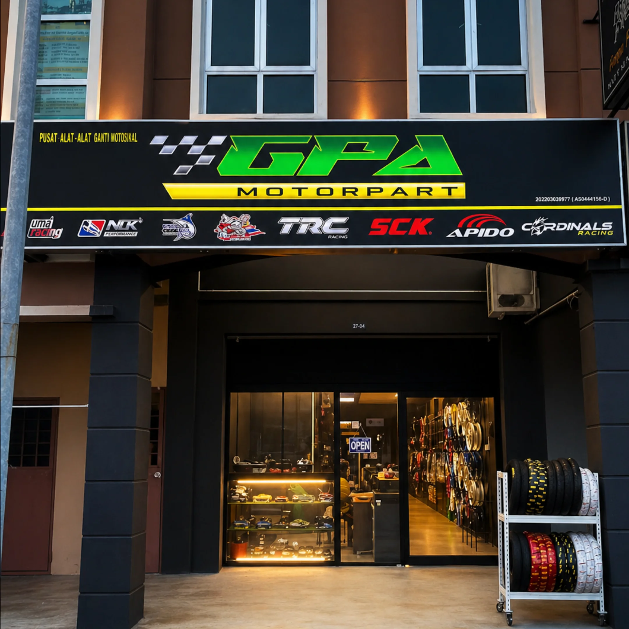 GPA Motorpart's store in Senawang, with its sign and motorcycle parts on display